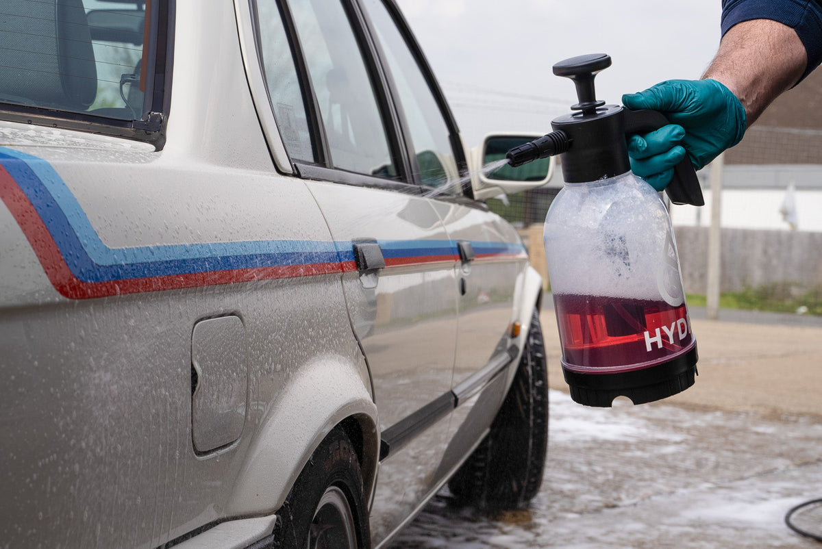 Pre wash in the Hydro Spray Bottle being applied to a car